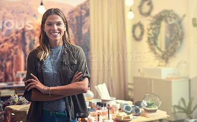 Buy stock photo Shot of a confident young entrepreneur working in her store