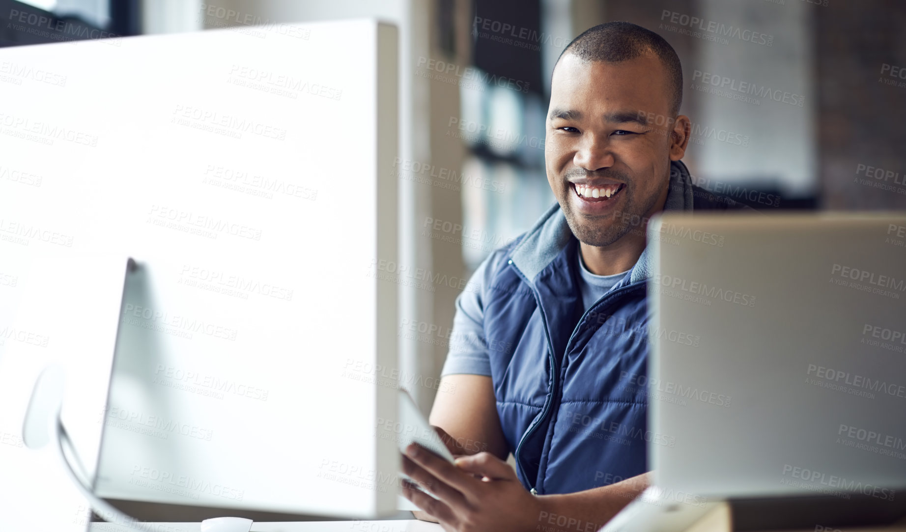 Buy stock photo Cropped shot of a businessman working on his computer in an office