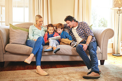 Buy stock photo Cropped shot of a family spending quality time together at home