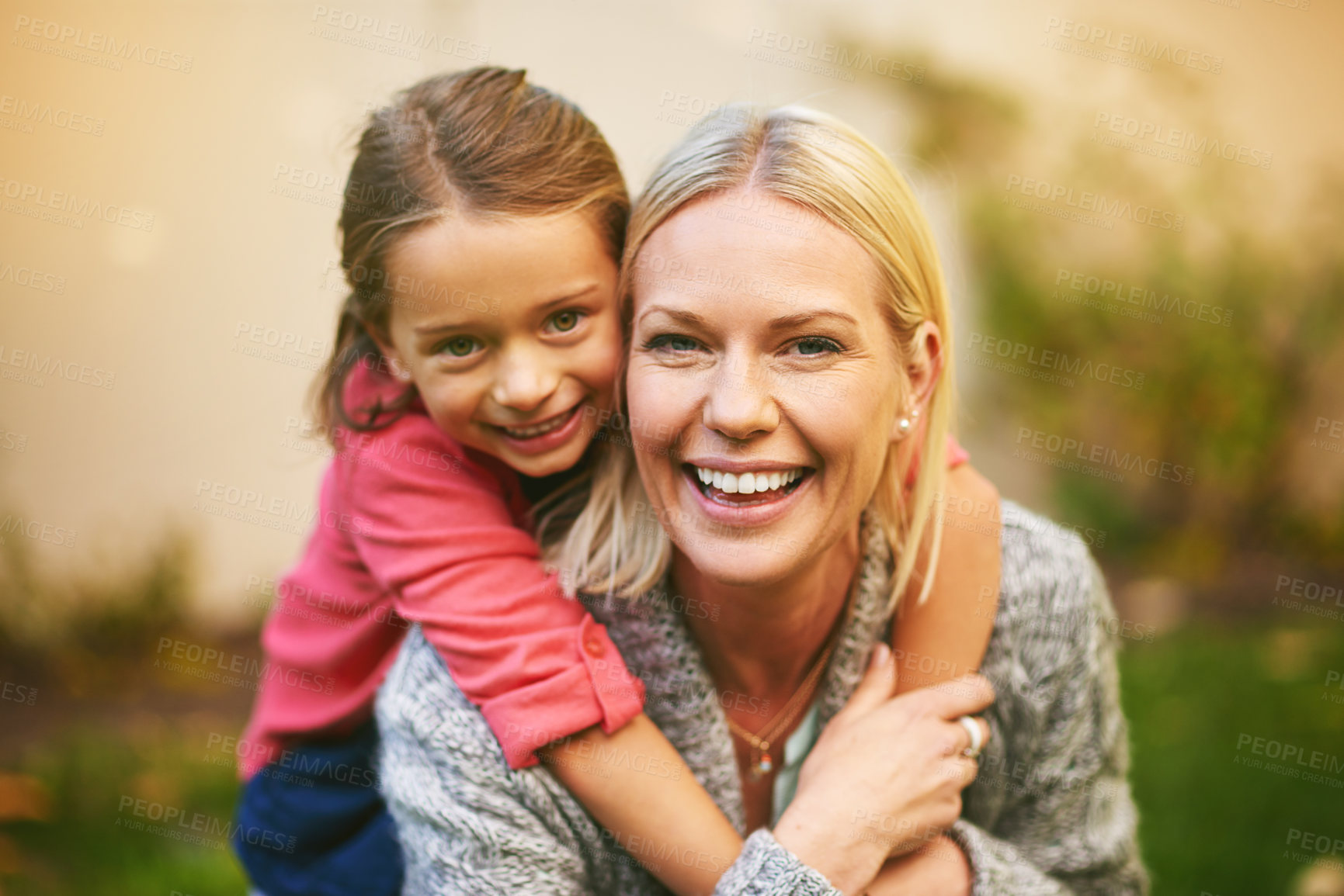 Buy stock photo Happy, mother and daughter hug in portrait together outside for love, relationship and quality time. Smiling, woman and child embrace in backyard garden for family bonding, togetherness and memories