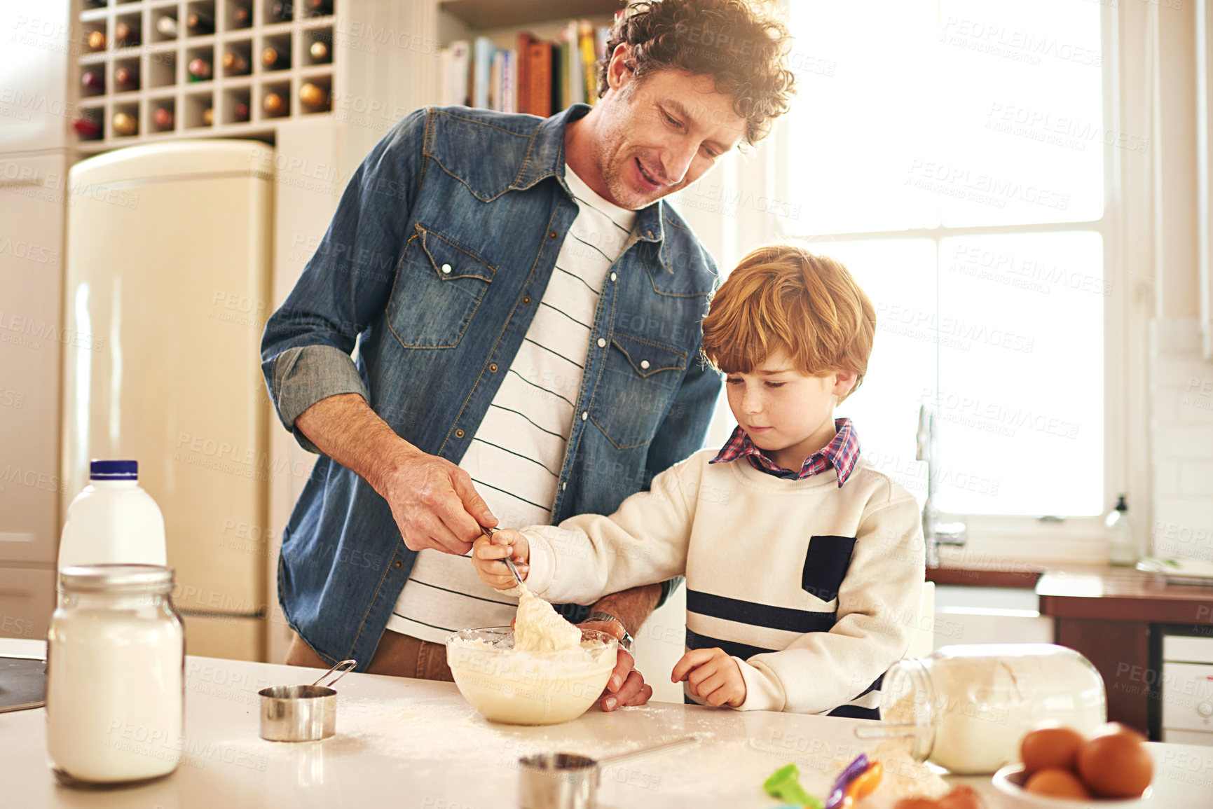 Buy stock photo Father, son and baking with dough in kitchen for bonding, bread or donut or cake for family. Man, boy child and cooking in home with love for food, ingredients and mixing for learning or development