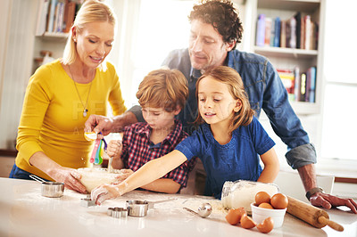 Buy stock photo Mom, dad and kids mixing ingredients for desserts, pastries or biscuits and cake together. Mother, father and children in kitchen baking cookies for learning, development and bonding as family. 