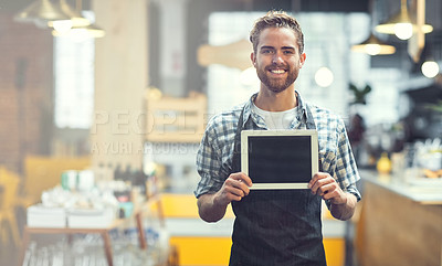 Buy stock photo Portrait of a young man showing a blank screen on a digital tablet in his store
