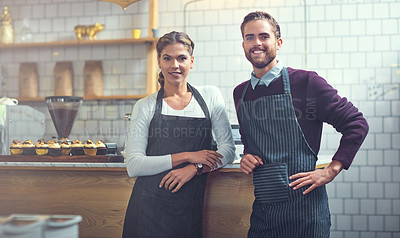 Buy stock photo Portrait of two young business owners working in their store