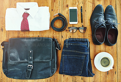 Buy stock photo Business clothes, shoes and bag on table with phone, glasses or coffee cup for career opportunity. Fashion, style and jeans for creative job and startup tech company with shirt or glasses in top view