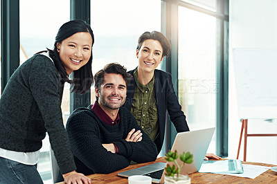 Buy stock photo Team of businesspeople and talking for work, planning or research at a desk with laptop and documents in office. Corporate people, computer and smile for ideas and vision for company project