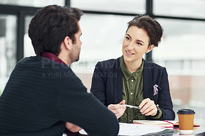 Buy stock photo Cropped shot of a businesswoman conducting an interview with an unidentifiable candidate in her office