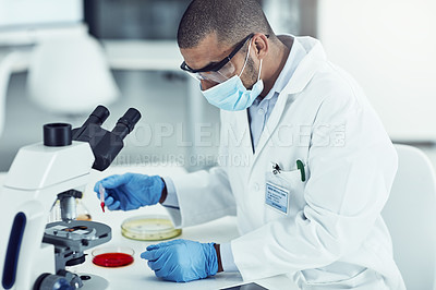 Buy stock photo Medical, healthcare and science professional testing monkeypox, ebola or marburg virus under microscope in medical research. Biologist, scientist or pathologist examining DNA chemical reaction in lab
