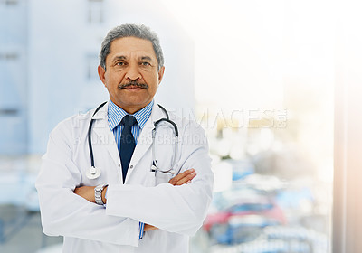 Buy stock photo Portrait of a confident and mature doctor folding his arms Portrait of a confident and mature doctor folding his arms