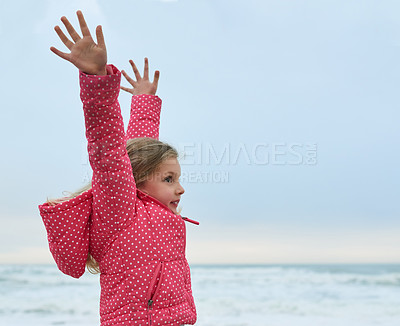 Buy stock photo Shot of a little girl at the beach
