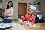 She always helps her mom with the baking