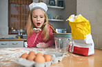 She's a happy little baker