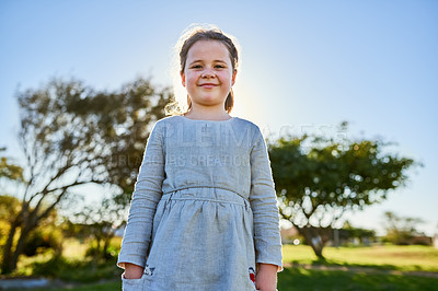 Buy stock photo Portrait of a cute little girl enjoying a day at the park