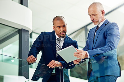Buy stock photo Business men, team and tablet for advice in office of discussion, planning and legal analysis in law firm. Diversity, CEO and mentor of digital collaboration, technology and review online information
