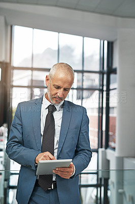 Buy stock photo Tablet, focus and ceo with business man in office for networking, research and digital. Social media, internet and email with senior male employee for corporate, professional and communication