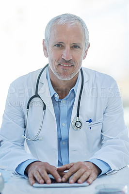 Buy stock photo Doctor, mature and portrait with tablet for hospital consulting with stethoscope, cardiology or research. Male person, face and desk for future telehealth or online connection, life insurance or app