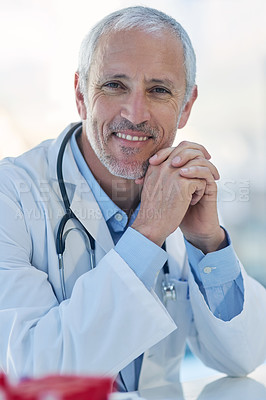 Buy stock photo Portrait, happy and mature doctor with in clinic for career, stethoscope and treatment. Healthcare professional, male person and lab coat in hospital for medical, wellness and smile in office