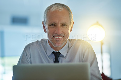 Buy stock photo Portrait of a mature businessman sitting in a modern office