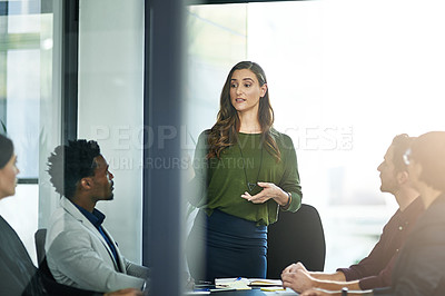 Buy stock photo Business woman, presentation and team with coach for boardroom discussion, meeting or collaboration. Group of employees listening to presenter for company strategy, mission or planning at the office