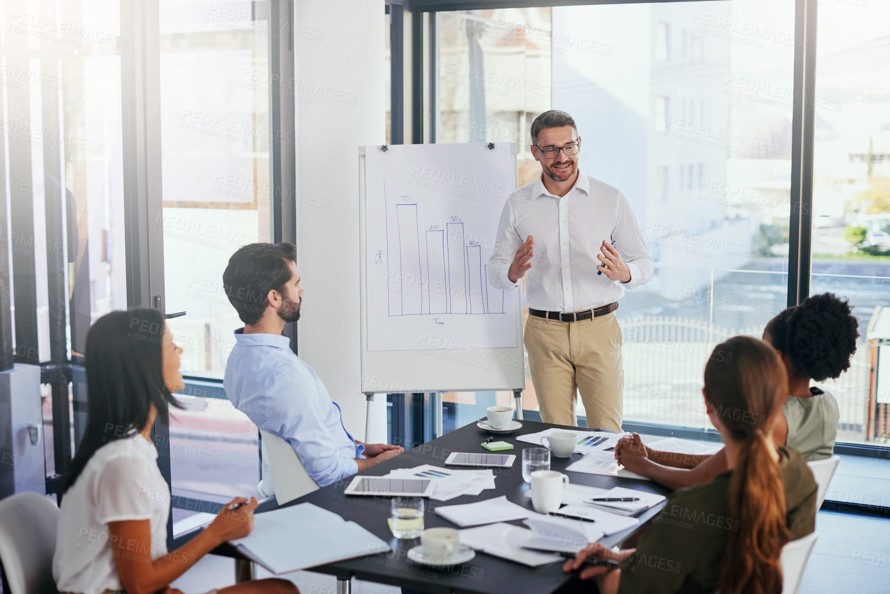 Buy stock photo Businesspeople, meeting and office with graph for presentation in boardroom for business with strategy. Teamwork, planning and training in conference with data, analytics and statistics for trade