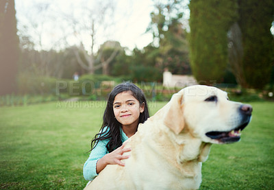 Buy stock photo Girl child, portrait and happy with dog while outside, smile and animal care with puppy in garden. Kid, together and cuddle pet in hands for love, hug and fun playing for relaxation or bonding
