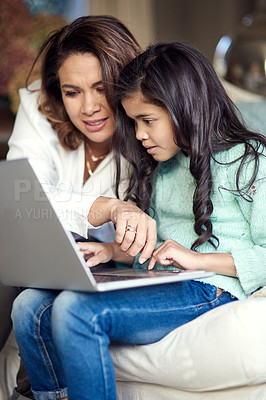 Buy stock photo Education, family and mother with daughter on laptop for child development, learning or study in home. Computer, help or support and woman single parent helping girl kid with school homework