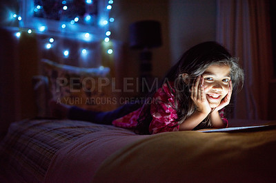 Buy stock photo Night, smile and tablet with portrait of girl in bedroom of home for gaming or watching movie. Bed, internet and technology with happy young child in apartment for evening browsing or entertainment