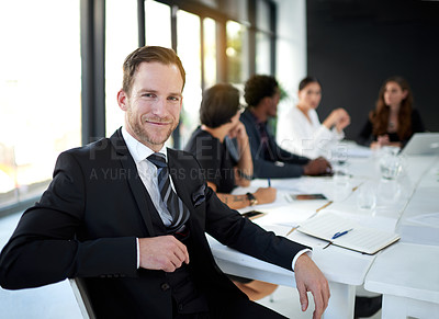 Buy stock photo Meeting, portrait and businessman in boardroom with business people, confidence or leadership. Conference room, men and women together in conversation for planning, strategy or b2b workshop at office