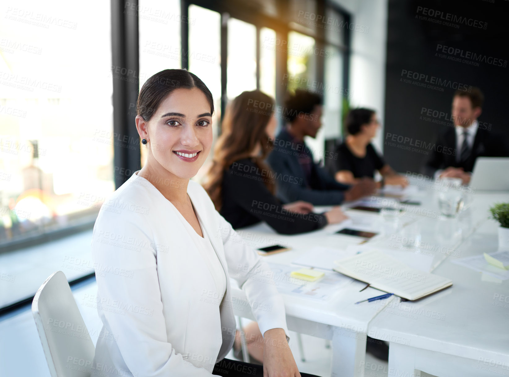 Buy stock photo Meeting, portrait and businesswoman in conference room with confidence, business people and leadership. Boardroom, men and women in conversation for planning, strategy or workshop at startup office