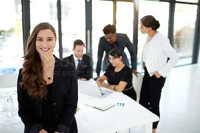 Buy stock photo Professional, portrait of woman in office with confidence for leader or manager and team in meeting. Pride, smile and businesswoman with business people, collaboration and work on marketing strategy