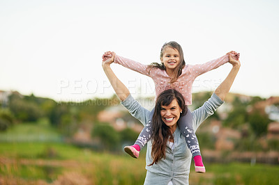 Buy stock photo Portrait of a mother and daughter enjoying some quality time together outdoors