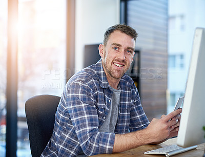 Buy stock photo Phone, computer and portrait of creative businessman in office with opportunity, confidence and tech startup. Web design, pride and happy face of online developer with professional career at agency