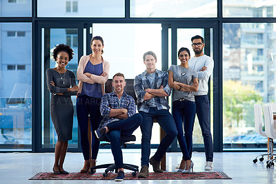 Buy stock photo Portrait of a group of young colleagues working together in a modern office