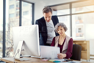 Buy stock photo Mature, business people and partnership with paperwork in office for corporate planning and feedback meeting. Professional, employees and collaboration with review documents with project information