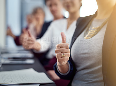 Buy stock photo Cropped shot of a group of businesspeople sitting in a conference