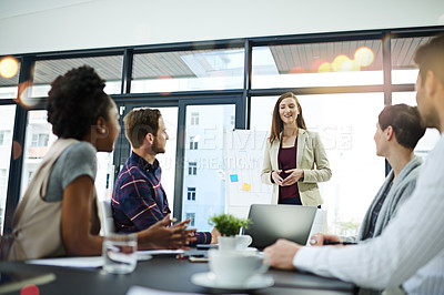 Buy stock photo Meeting, colleagues and woman presenter in boardroom, conversation or workshop in office. Discussion, brainstorm and planning for corporate strategy, collaboration and female person or sales agent
