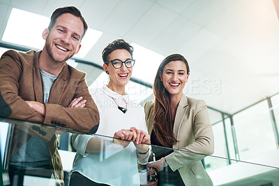 Buy stock photo Business people, portrait and picture with smile in office for company website, social media and laugh together. Journalists, man and women with pose for photography, profile post or low angle