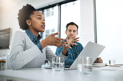 Buy stock photo Cropped shot of businesspeople having a discussion in an office