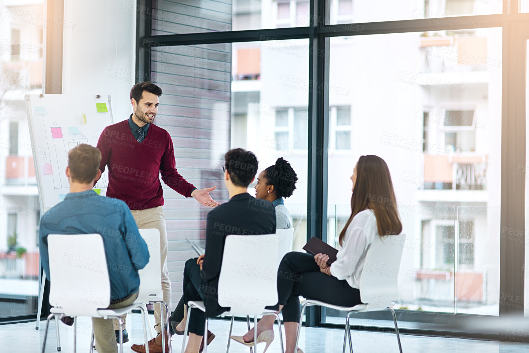 Buy stock photo Presentation, business people and whiteboard in conference room for brainstorming, strategy and planning project. Lens flare, diversity and employees for meeting, ideas or teamwork at startup