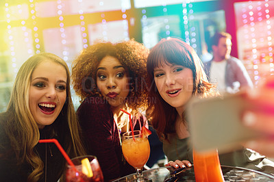 Buy stock photo Woman, friends and drinks or party selfie, diversity and fun with alcohol or cocktails in club for entertainment. Smartphone, happy and online for social media post, technology and celebration