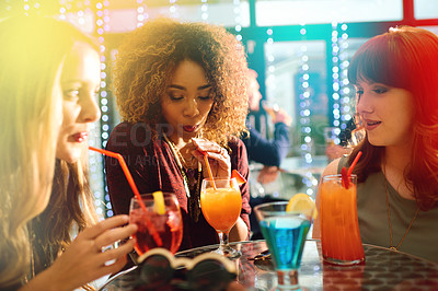 Buy stock photo Party, friends and drink cocktail at pub together for celebration, event or happy hour at night club. Group, girls and women with alcohol glass at bar for social gathering, rave or bokeh with flare
