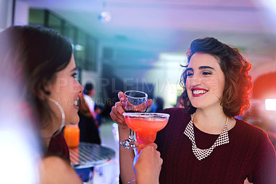 Buy stock photo Party, friends and toast with cocktail drink at pub together for celebration, event or happy hour at night club. Cheers, girls and women with alcohol glass at bar for social gathering, rave and flare