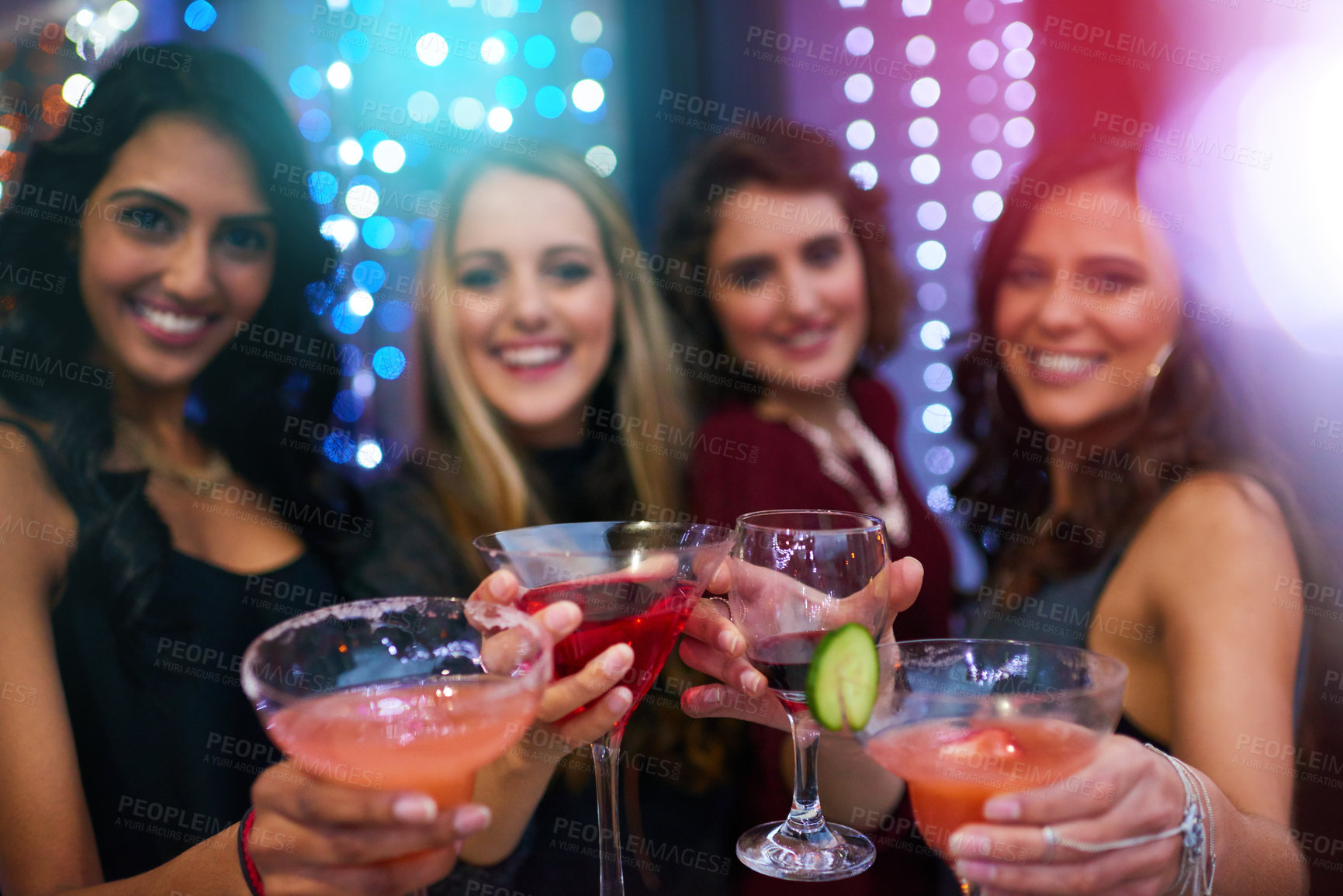Buy stock photo Women, group and cocktail with toast for portrait at nightclub, event or happy hour together. People, club and drink with friends, alcohol and smile with celebration for new year with chat in night