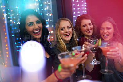 Buy stock photo Women, friends and cocktail party with toast for portrait at nightclub, event and happy hour. People, club and drink with group, alcohol and smile with celebration for new year with cheers in night