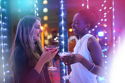 Buy stock photo Women, friends and cocktail with smile in club, event and happy hour in night. People, nightclub and drink with margarita, alcohol and diversity with celebration, excited and chat at new years party 