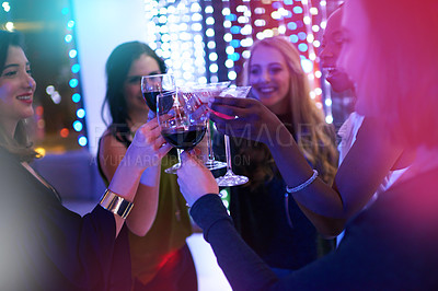 Buy stock photo Wine, cocktail and women with club toast celebration, night or happy hour with bonding. Glass, crowd and group of friends with mojito cheers for luxury birthday, party or disco event at restaurant