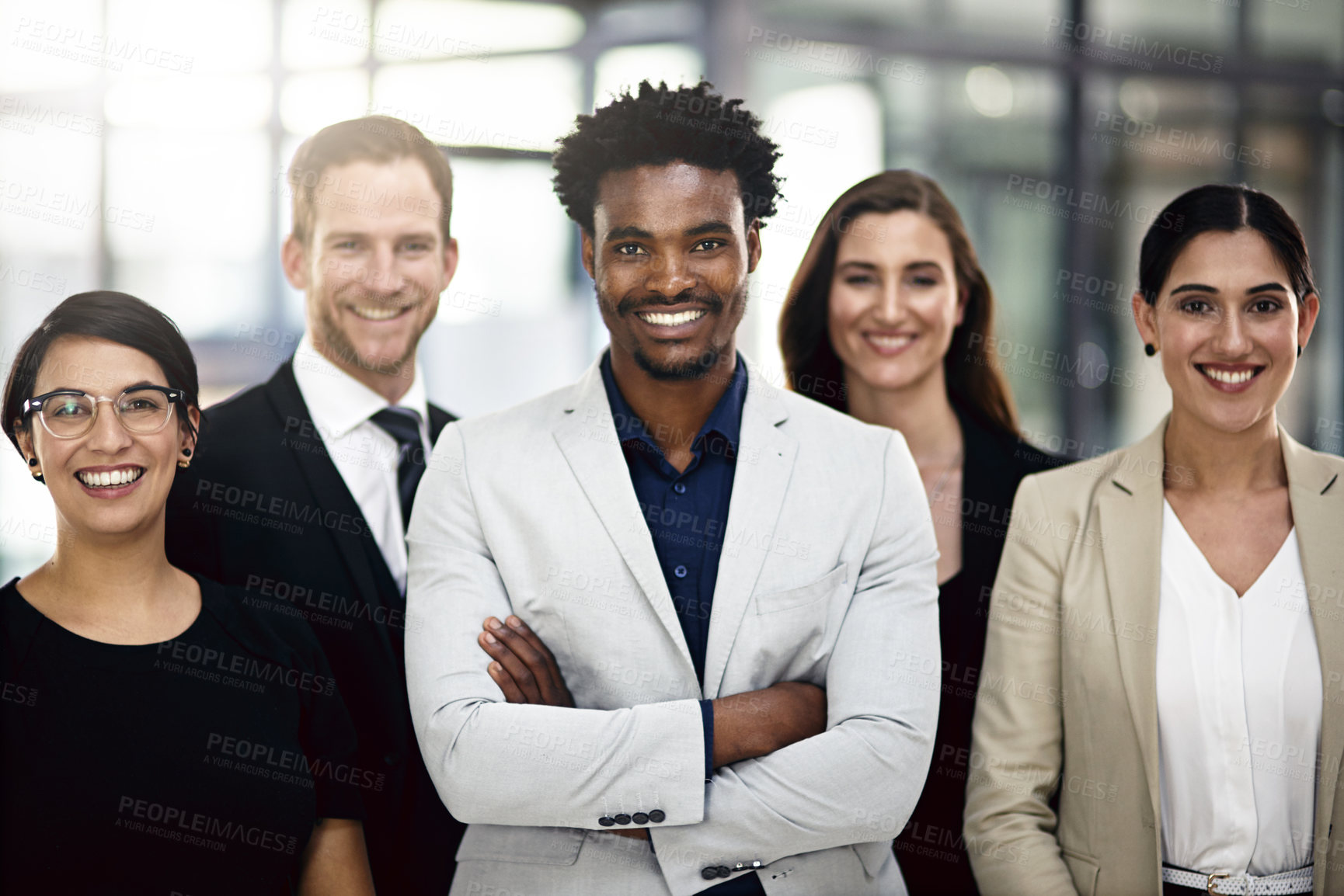 Buy stock photo Cropped portrait of a group of businesspeople standing in the office