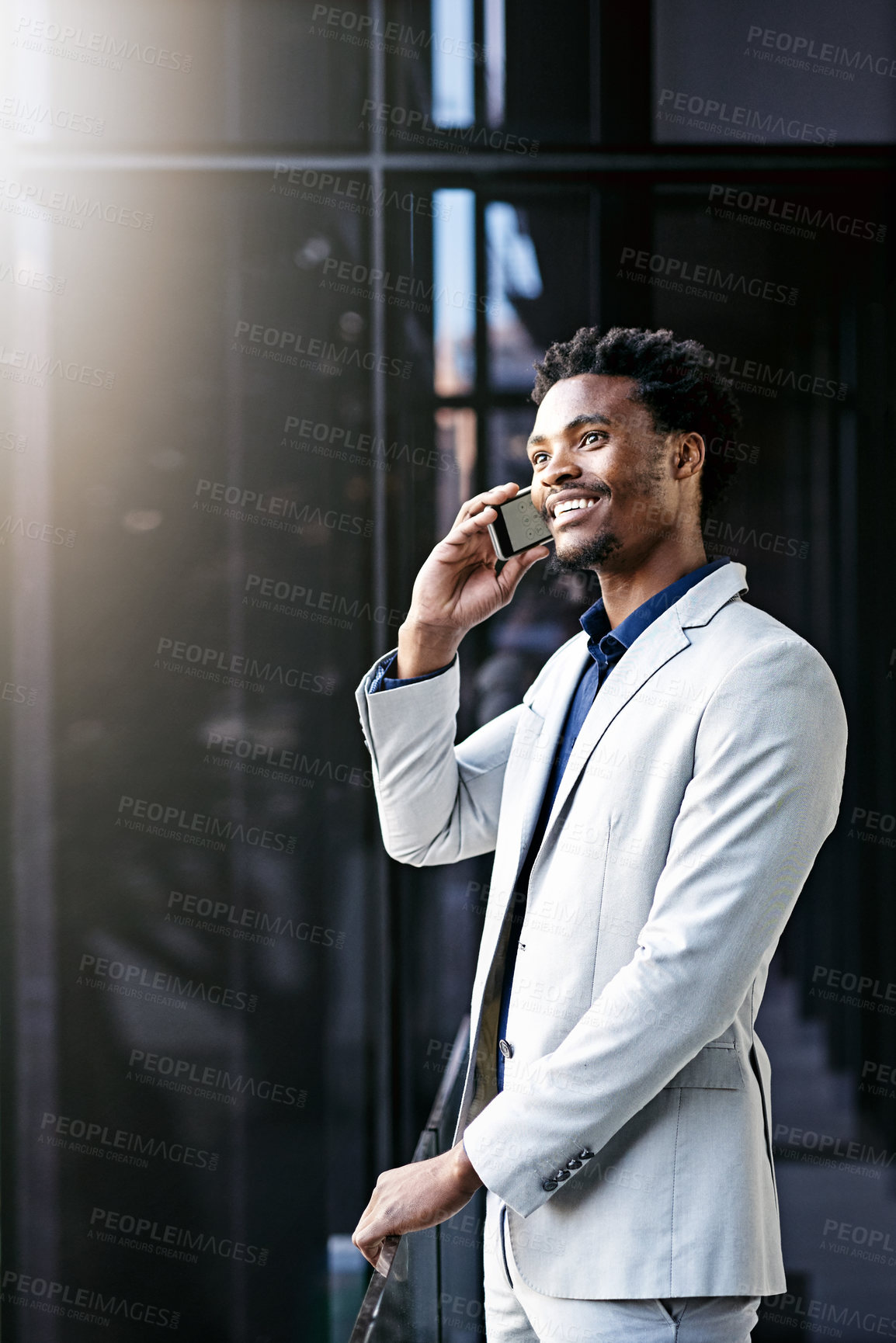 Buy stock photo Happy, black man and business trip with phone call in city for travel, career opportunity or job discussion. African businessman or employee with smile on mobile smartphone in conversation or commute