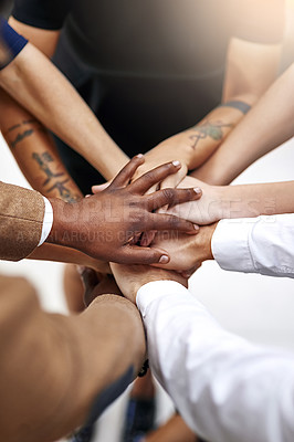 Buy stock photo Closeup shot of a group of people joining their hands together in unity