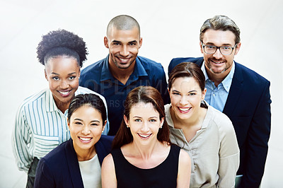 Buy stock photo High angle portrait of a group of businesspeople standing together in the office